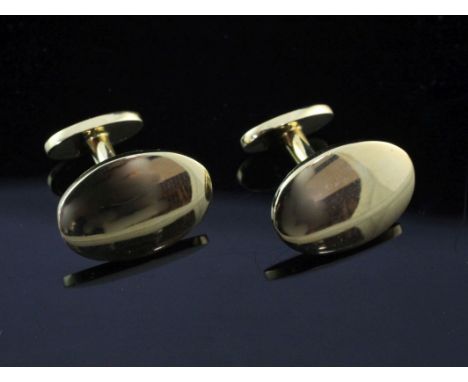 A modern pair of Tiffany & Co 18ct gold oval cufflinks, with pouch and box, 14 grams.