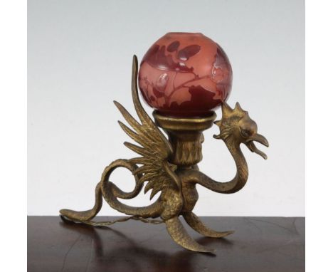 A Galle cameo glass shade, with a brass 'dragon' lamp base, c.1910, the globular shade with pink acorns and acorn leaves, etc