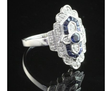 An Art Deco style 18ct white gold, sapphire and diamond cluster ring, size P.