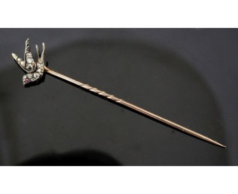 A Victorian gold and silver, rose cut diamond and ruby set swallow stick pin, 2.5in.