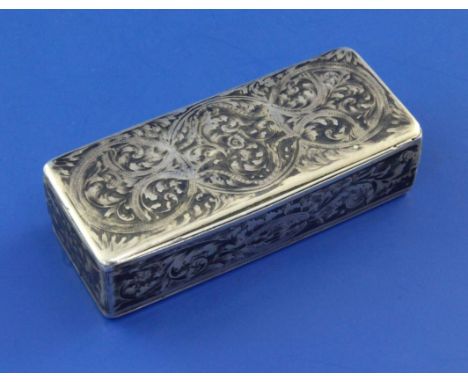 A 19th century Russian 84 zolotnik silver and niello snuff box, of rectangular form, decorated with scrolling foliage, assay 