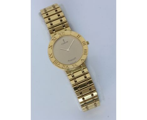 GOLDENE CORUM DAMENARMBANDUHR.750/000 Gelbgold mit Milanaise-Armband. Modell "Romulus". Quarzwerk. L.19cm, Brutto ca. 60,93g.
