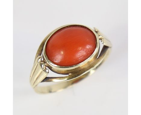 SCANDIA AFFINERINGS VAERK - a Danish modernist coral ring, 14ct gold settings set with polished cabochon coral, setting heigh