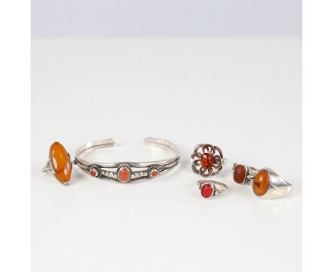 Various Vintage Danish coral and amber jewellery, comprising torque bangle and 5 rings, stylised silver settings, bangle inte