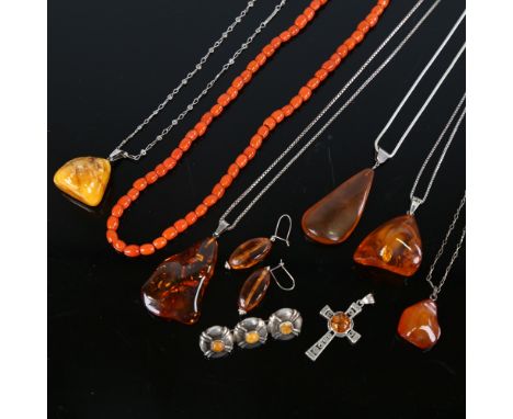 Various Danish Baltic amber jewellery, including pendant necklaces, Art Nouveau brooch, cross pendant and ceramic bead neckla