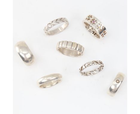 7 Danish sterling silver band rings, stylised settings, makers include Hermann Siersbol and Frits Heiring Sorensen, sizes L, 