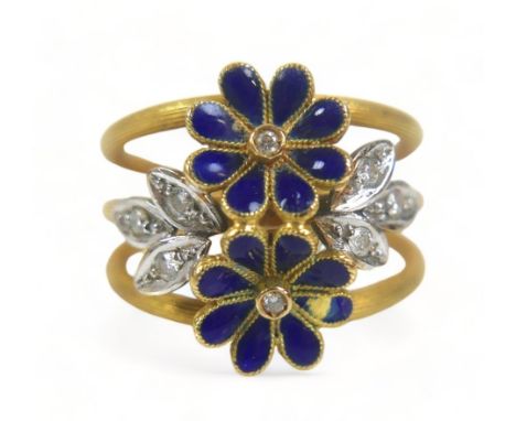 A diamond and enamel flower head ring, with eight small diamonds, the band stamped '750', size M, 7.3g.Enamel to one petal ch