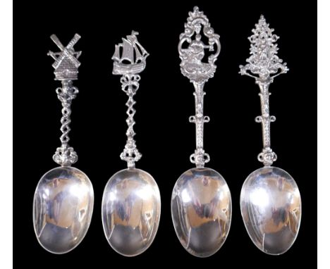 Four Dutch silver spoons with decorative finials (possibly earlier bowls with later handles) with import marks for London 189