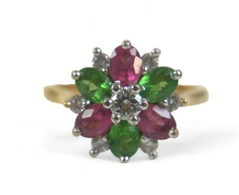 An 18ct gold, diamond and tourmaline thirteen-stone flowerhead cluster ring, the central brilliant cut diamond approximately 