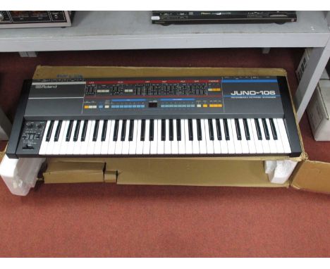 Roland Juno-106 Polyphonic Synthesizer, boxed with instruction manual, (untested).