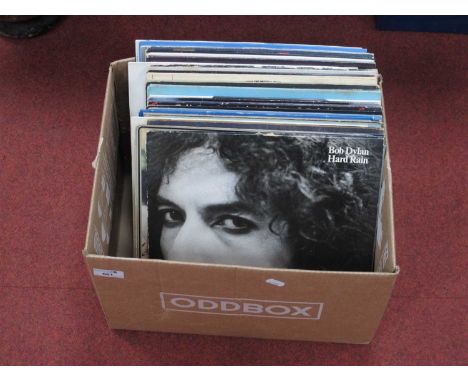 A Collection of Thirty Five L.P's, comprising of Bob Dylan - Hard Rain, Oh Mercy, Desire, Blood On The Tracks, Peter Frampton