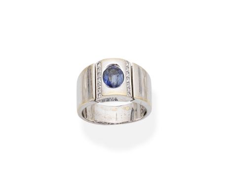 SAPPHIRE AND DIAMOND RINGCentrally set with an oval-cut sapphire between rows of brilliant-cut diamonds, unsigned, ring size 