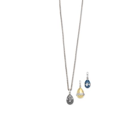 FABERGÉ: ENAMEL EGG PENDANT NECKLACE AND TWO ENAMEL EGG PENDANTS1st: The black enamel egg accented by brilliant-cut diamonds,