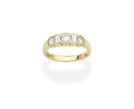 DIAMOND RING, 1998Set to the front with alternating baguette and brilliant-cut diamonds, mounted in 18 carat yellow gold,  di