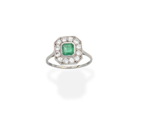 EMERALD AND DIAMOND RINGThe square step-cut emerald set within a brilliant-cut diamond surround, ring size approx. O½For furt