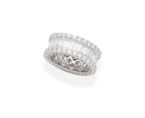 DIAMOND ETERNITY RINGDesigned as a central row of baguette-cut diamonds between courses of brilliant-cut diamonds, diamonds a