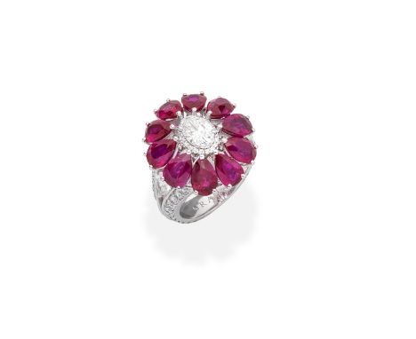 GRAFF: RUBY AND DIAMOND CLUSTER RINGThe central oval and brilliant-cut diamond cluster within a surround of pear-shaped rubie