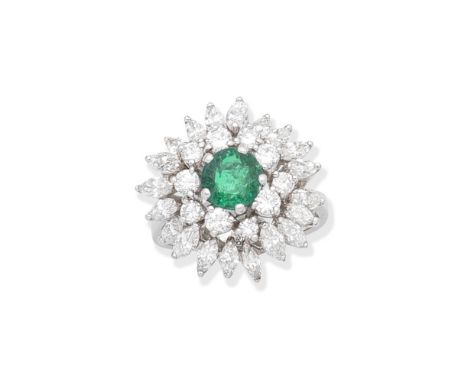 EMERALD AND DIAMOND DRESS RINGThe circular-cut emerald set within a tiered brilliant and marquise-cut diamond surround, ring 