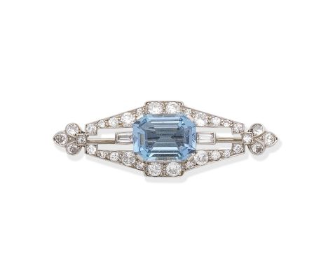 ART DECO AQUAMARINE AND DIAMOND BROOCH, CIRCA 1920The octagonal step-cut aquamarine between baguette-cut diamond shoulders, i