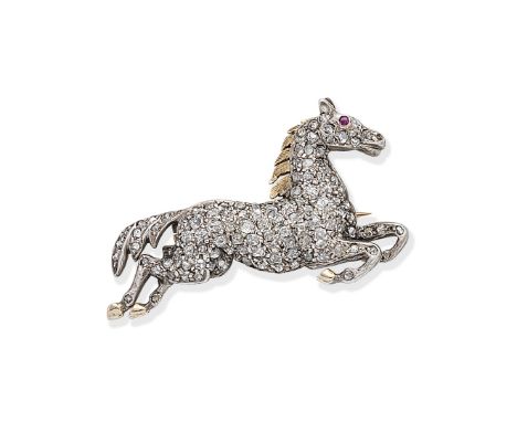 DIAMOND HORSE BROOCHDesigned as a galloping horse, set with rose and cushion-shaped diamonds, with a cabochon ruby eye, mount