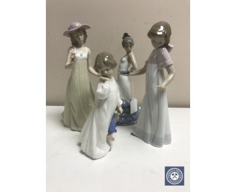 Four Nao figures of ladies (a/f)