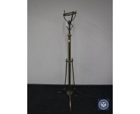 A Victorian brass rise and fall oil lamp stand 