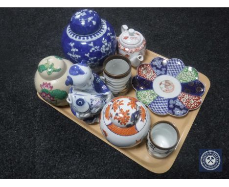 A tray of Oriental china including brush pots, lidded ginger jars, teapot etc.