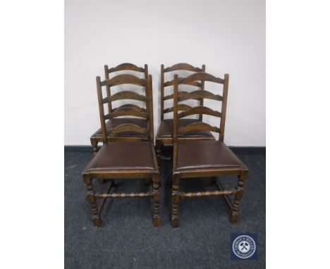 Four oak ladder back dining chairs 