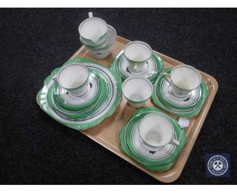 A twenty-one piece Victorian china Art Deco style tea service