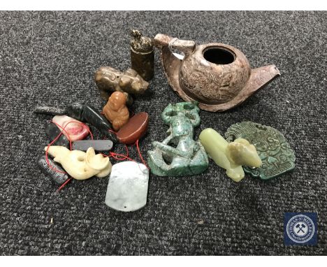 A Chinese soapstone teapot, lacking lid, together with a box containing a collection of Chinese soapstone figures and seals