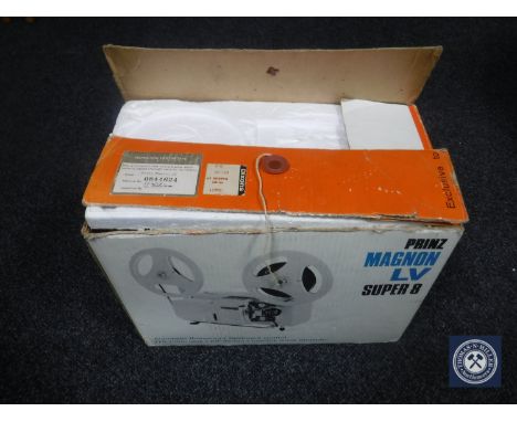 A boxed Prinz Magnon LV super 8 projector with Tom and Jerry Reel