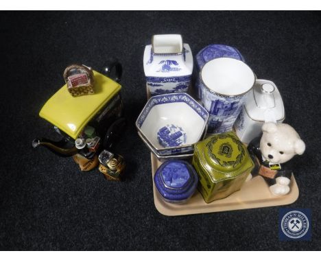 A tray of assorted Ringtons china, vases bowls and caddies together with a Ringtons delivery van, novelty teapot and Ringtons