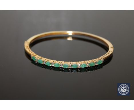 A synthetic emerald bangle