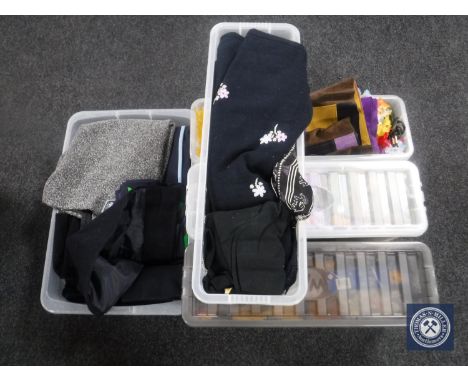 Five plastic storage boxes containing vintage and later clothing
