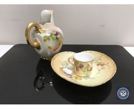 A Royal Worcester miniature blush ivory loving cup, height 4cm, together with a similar heart-shaped dish (a/f) and a hand-pa