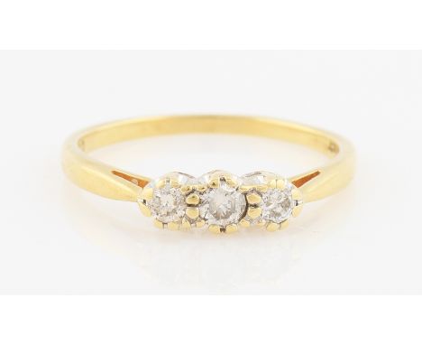 SOLD WITHOUT BUYERS PREMIUM AND VAT. An 18ct yellow gold diamond three stone ring, set with three graduated round brilliant c