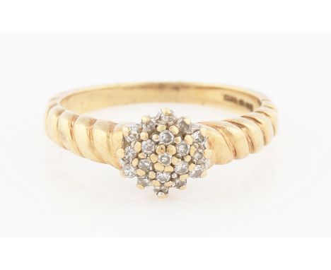 SOLD WITHOUT BUYERS PREMIUM AND VAT. A 9ct yellow gold diamond cluster ring, set with eight-cut diamonds in tiered design, ha