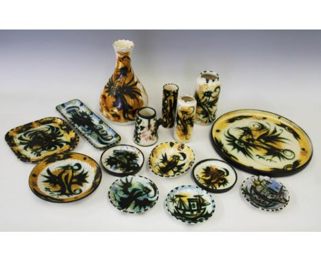 A group of fifteen items of Celtic studio pottery items including vases, cup, plates and dishes, most having phoenix design, 