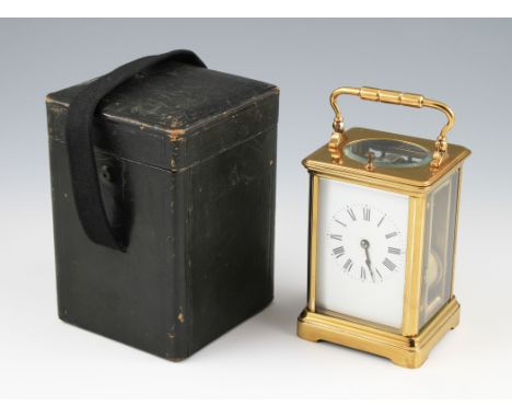 An early 20th Century brass French repeater carriage clock, the white enamel face having black Roman numeral hourly markers w