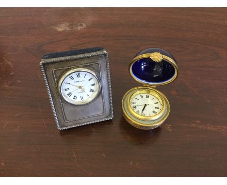 A silver framed Kitney & Co. desk clock, hallmarked London 1996, together with a Limoges desk clock of circular form with blu