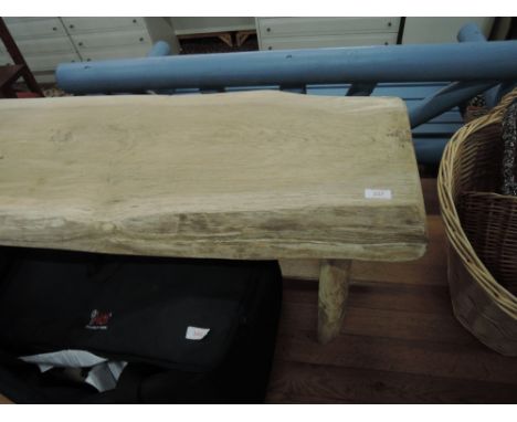 A rustic oak bench