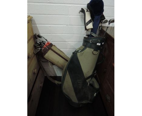 Two sets of vintage golf clubs in bags