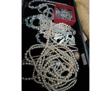 A selection of simulated pearl and crystal bead necklaces, loose beads etc