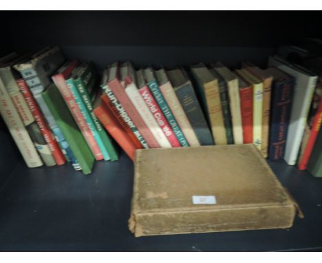 A selection of vintage cricket and football books etc