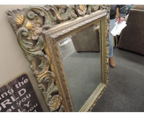 A vintage gilt frame foliate mirror