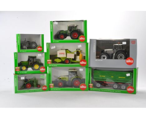 Siku 1/32 farm issues comprising seven boxed tractor and implement items. Excellent in boxes. 