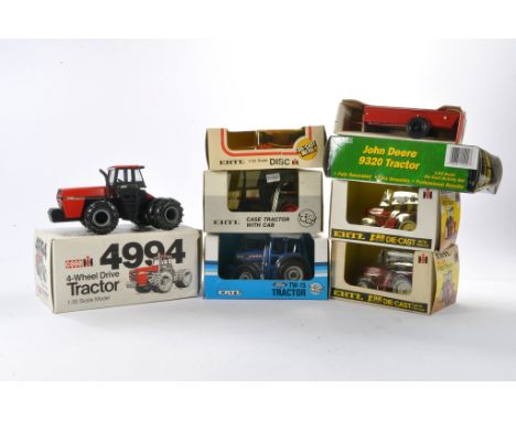 Ertl farm group comprising tractor and implement issues including International, Ford, Case, etc. Mostly look to be without f