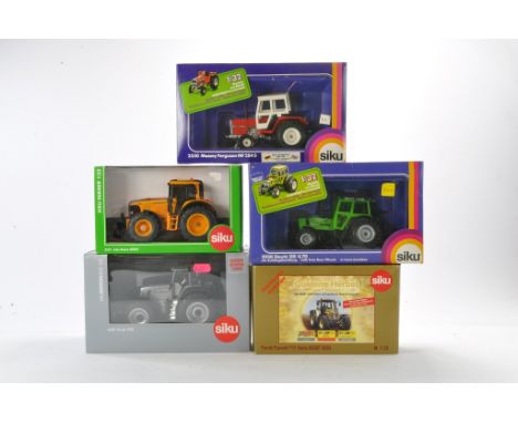 Siku Tractor group including older issues plus limited editions as shown. Excellent in boxes. 