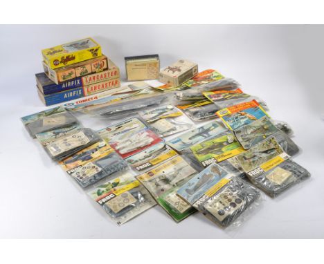 Twenty Six plastic model kits, mostly older issues to include a large selection of bagged kits from Frog, Aurora and Airfix i