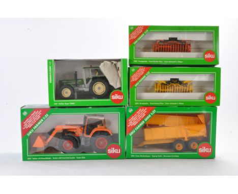 Siku group of 1/32 Tractor and Implement issues including some harder to find examples as shown. Excellent in boxes. 